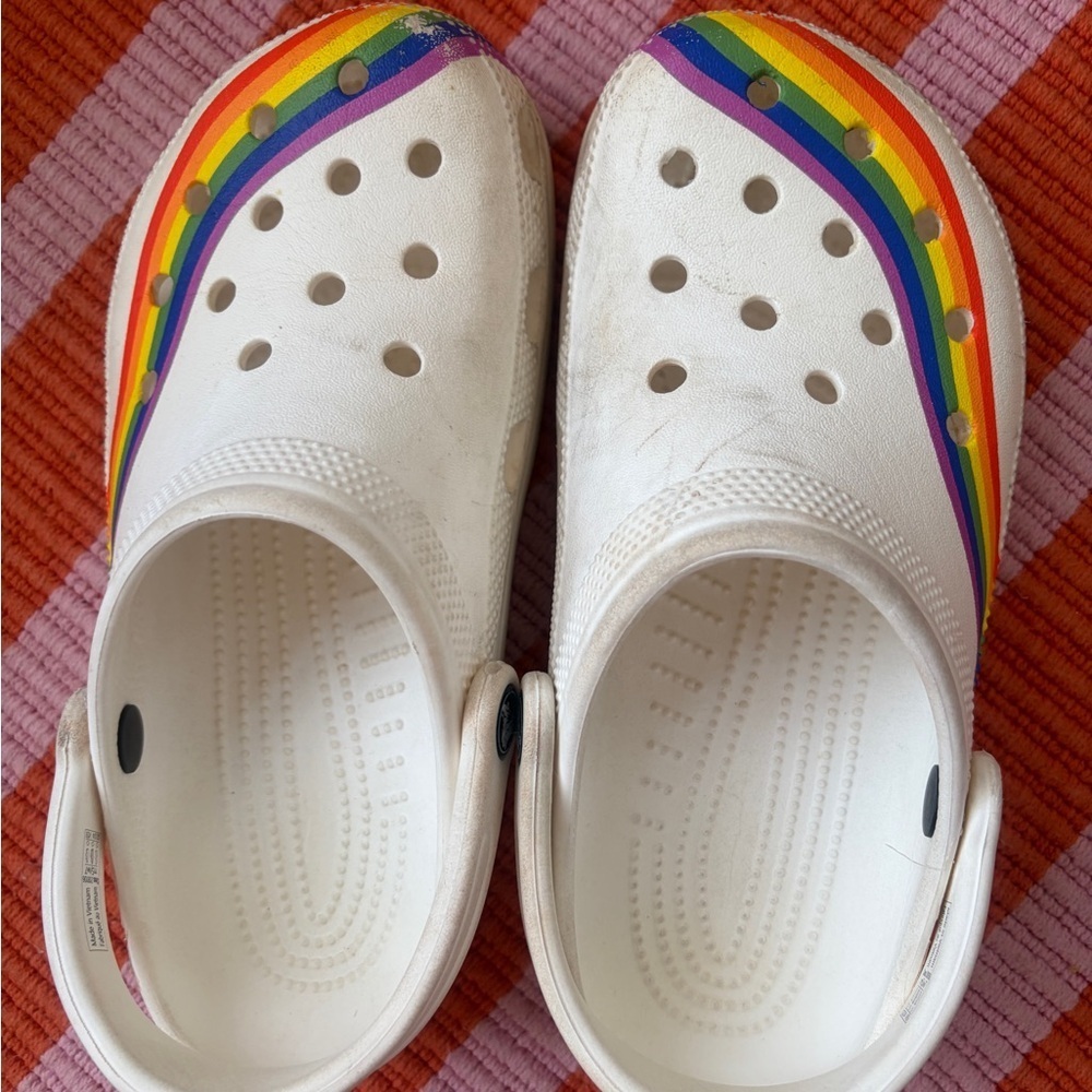 CROCs women’s size 7, size 5 men’s rainbow clog. Signs of wear. See pics. Pride!